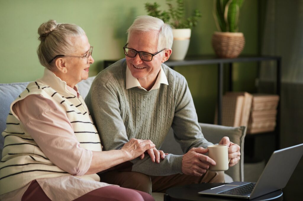happy-senior-husband-and-wife-having-talk-while